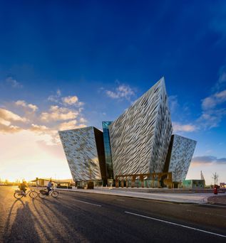 Cyclists at Titanic Belfast_sunset_