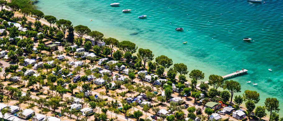 Camping Italien Urlaub Reisen Campingplatz am Ufer des Gardasee