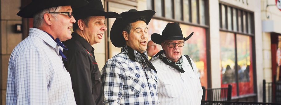 4 Männer mit Cowboyhüten