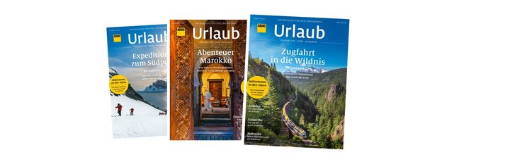 Drei unterschiedliche Ausgaben des ADAC Magazins Urlaub nebeneinander – mit Reisezielen in verschneiten Bergen, orientalischer Architektur und kanadischer Wildnis.
