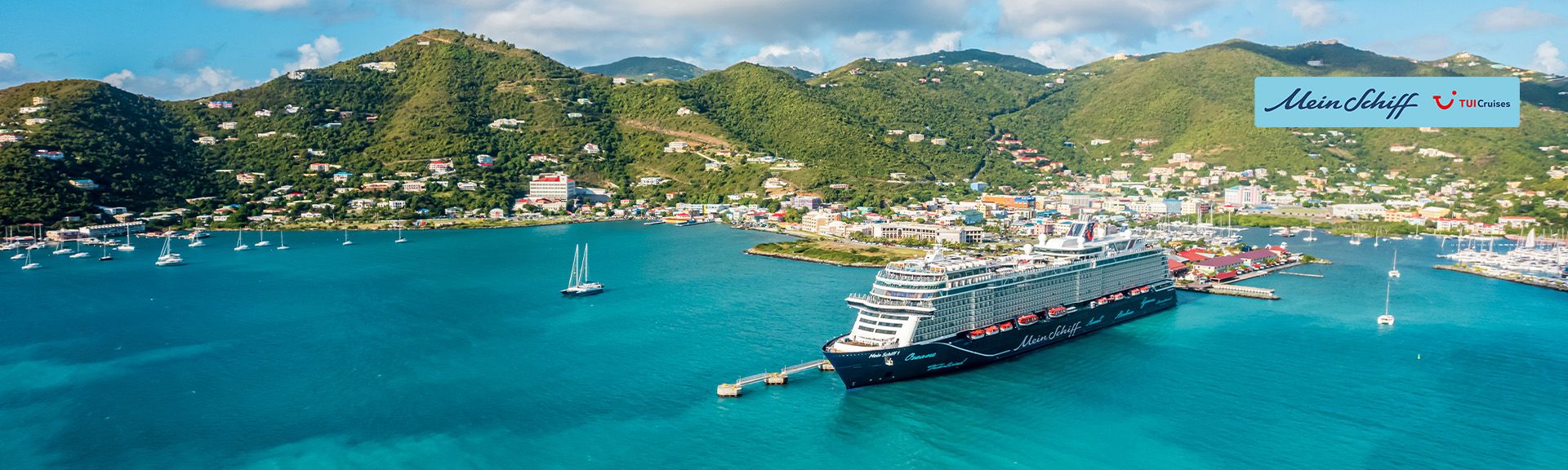 TUIC Cruises Mein Schiff  im Sonnenuntergang im Hafen von Antigua