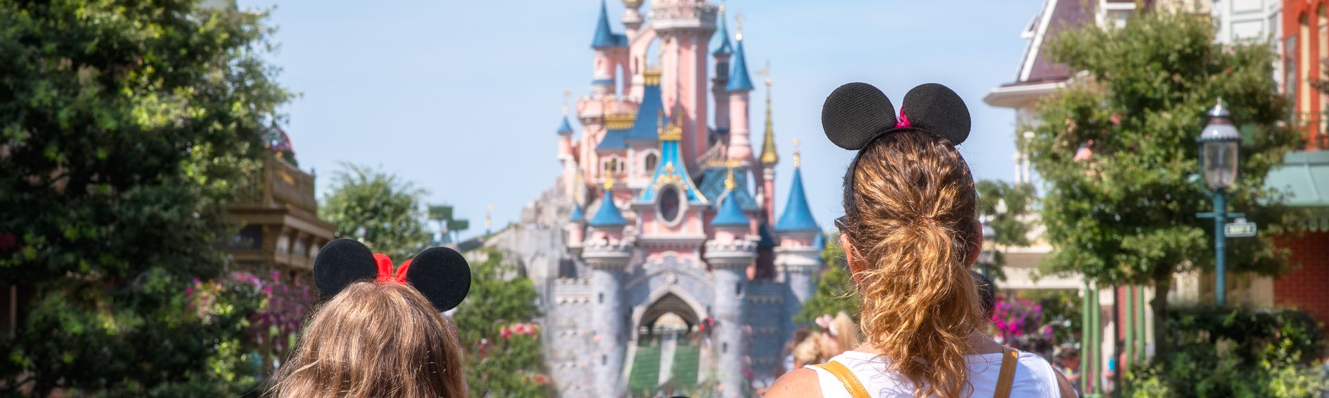 A mother and her daughters gaze at the Princess Castle the Disneyland Paris park. August 28, 2019, Paris, France