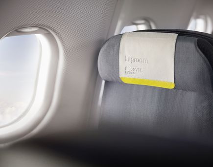Sitz im Flugzeug der Discover Airlines