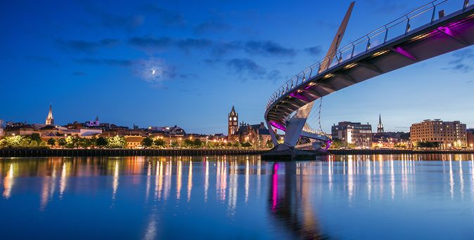 Night time peace bridge towards Derry City,