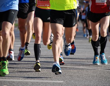 Beine von Marathonläufer